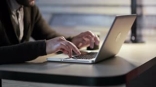 man-working-on-laptop-computer-in-the-workplace_e3lagflvg__S0000.jpg