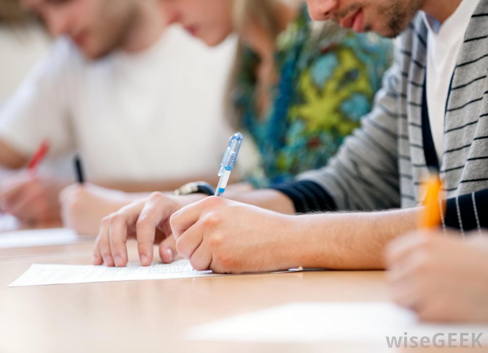 small-group-of-people-taking-test-on-desk.jpg